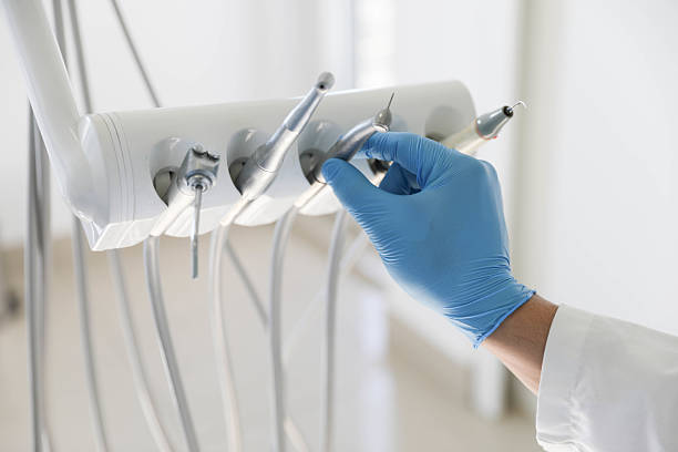 Professional Dental Implants technician working in Goliad County County, TX